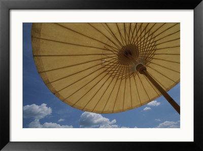 An Umbrella Blocks The Sun On A Phuket Island Beach by Jodi Cobb Pricing Limited Edition Print image