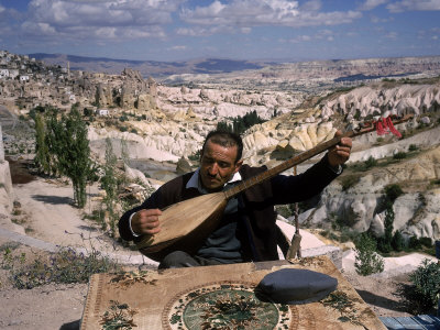 Turkish Man Playing A Type Of Mandolin Called A Sis by Bill Ray Pricing Limited Edition Print image