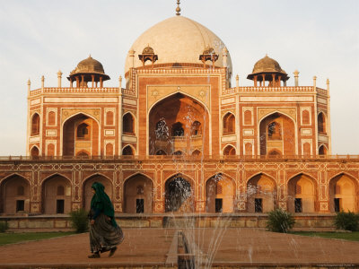 Woman Wearing Sari Walking Past Humayun's Tomb In New Delhi by Gavin Gough Pricing Limited Edition Print image