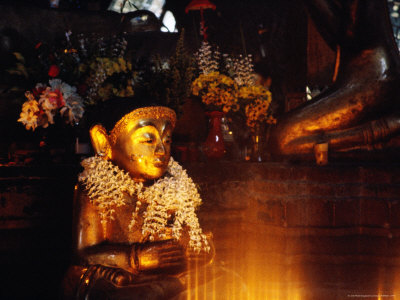 Buddha Statue At Theindawgyi Wearing A Garland Of Orchids, Myeik, Myanmar (Burma) by Joe Cummings Pricing Limited Edition Print image