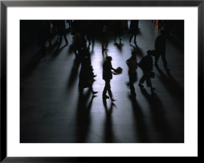 Commuters Silhouetted Inside Grand Central Station At Rush Hour, New York City, Usa by Corey Wise Pricing Limited Edition Print image
