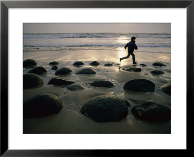 Jogger On A Stony Beach by Randy Olson Pricing Limited Edition Print image