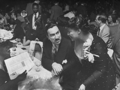 Pianist Hazel Scott And Husband Adam Clayton Powell Jr., Talking With Singer Ella Fitzgerald by Martha Holmes Pricing Limited Edition Print image