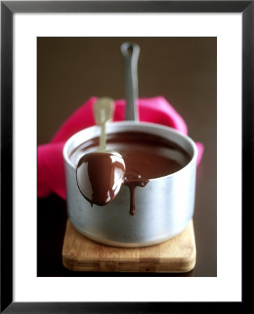 Tablespoon Lying On Pan Of Melted Couverture by Michael Paul Pricing Limited Edition Print image