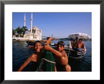 Kids With Ortakoy Mosque In Background, Istanbul, Turkey by Phil Weymouth Pricing Limited Edition Print image
