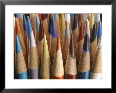 A Close View Of A Cluster Of Sharpened Colored Pencils by Raul Touzon Pricing Limited Edition Print image