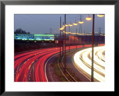 Light Streaks On Motorway At Dusk, Uk by Mike England Pricing Limited Edition Print image