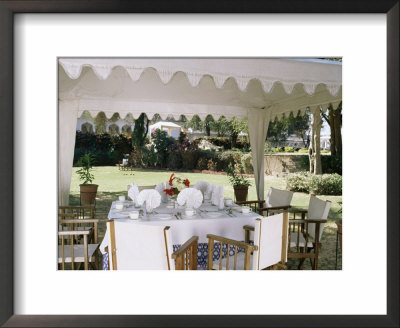 Dining Under Tented Awnings In The Garden With Croquet Set In The Background, Samode Bagh, by John Henry Claude Wilson Pricing Limited Edition Print image