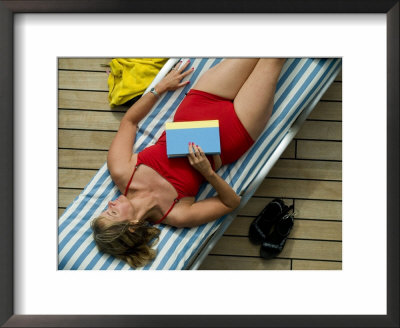 Close View Of Woman Sleeping On The Deck Of A Cruise Ship by Todd Gipstein Pricing Limited Edition Print image