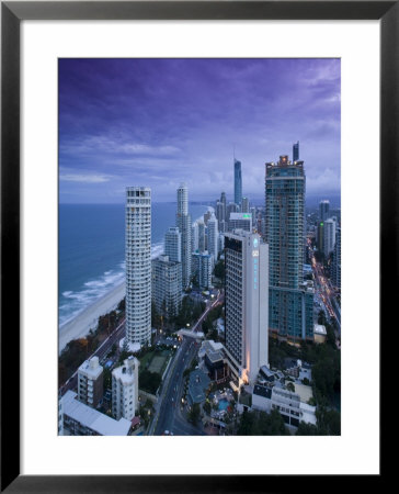 Australia, Queensland, Gold Coast, Surfer's Paradise, Evening View Of Surfer's Paradise Highrises by Walter Bibikow Pricing Limited Edition Print image