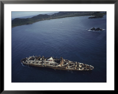 An Aerial View Of A Derelict Ship In The Caribbean by Jodi Cobb Pricing Limited Edition Print image