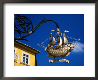 Golden Ship Hanging Sign, Old Town, Gyor, Gyor-Moson-Sopron, Hungary by Margie Politzer Pricing Limited Edition Print image
