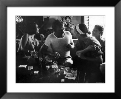 Elizabeth Taylor, Richard Burton, Ava Gardner And Man In Cantina by Gjon Mili Pricing Limited Edition Print image