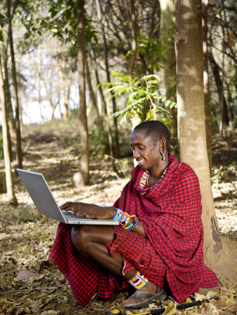 People In Africa Using A Notebook Computer by Scott Stulberg Pricing Limited Edition Print image