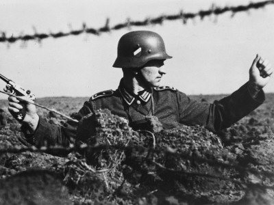 German Sergeant Major Standing In A Trench In France During World War Ii by Robert Hunt Pricing Limited Edition Print image