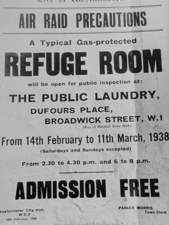 Poster Hanging On Church Notice Board Inviting The Public To Inspect A Gas-Protected Refuge Room by John Phillips Pricing Limited Edition Print image