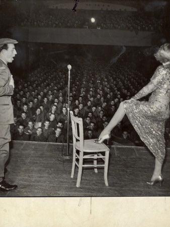 Marlene Dietrich Posing Seductively With Comedian Freddie Lightner At Uso Show For Us Servicemen by George Silk Pricing Limited Edition Print image