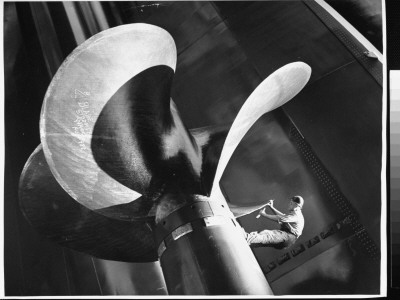 Inspecting Newly Constructed 34-Ton Propreller To Be Installed On The Ocean Liner At Shipyard by Alfred Eisenstaedt Pricing Limited Edition Print image