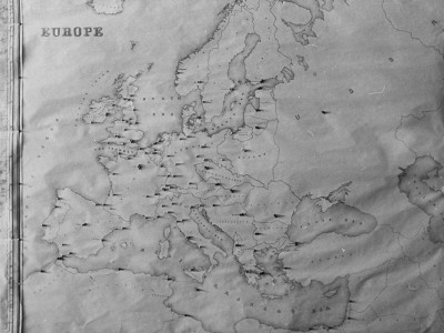 A Map In An Office Showing Countries Which Are Marked With Pegs by John Phillips Pricing Limited Edition Print image