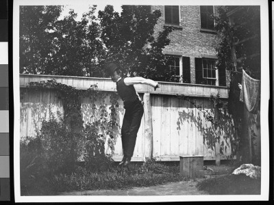 J.M. Cornell Jumping In The Backyard At 314 Livingston St by Wallace G. Levison Pricing Limited Edition Print image