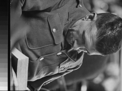 Uniformed Man Reading Book In The New York Public Library by Alfred Eisenstaedt Pricing Limited Edition Print image