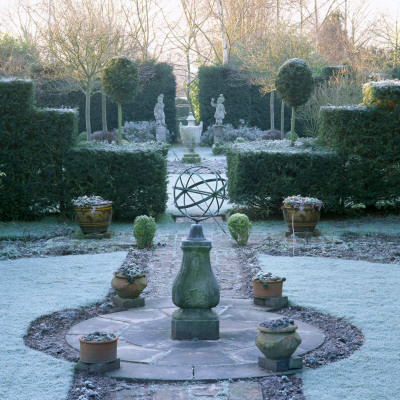 Armillary Sphere In Centre Of Formal Garden In Frost, Designer: Sir Roy Strong by Clive Nichols Pricing Limited Edition Print image