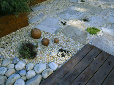 Roof Garden With Bamboo Fencing, White Boulders, Fossil Mint Slabs, Wooden Balls And Cedar Decking by Clive Nichols Pricing Limited Edition Print image