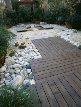 Roof Garden With Cedar Decking, Bamboo Loungers, White Boulders And Barleycorn Gravel by Clive Nichols Pricing Limited Edition Print image