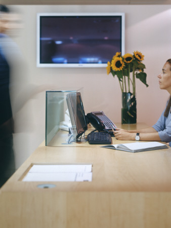 Office Life And Interiors, Reception Desk With Receptionist And Man Walking Up To Desk by David Churchill Pricing Limited Edition Print image