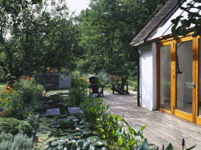 Lily Pond Beside Decking At Side Of House, Designer: Duncan Heather by Clive Nichols Pricing Limited Edition Print image