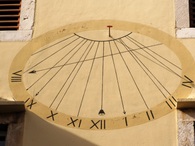 Sundial Painted On A Wall, Hvar, Dalmatian Coast, Croatia by Olwen Croft Pricing Limited Edition Print image