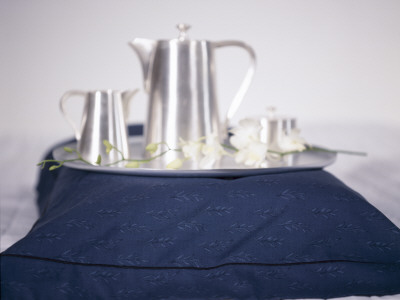 Silver Coffee Set On A Tray Balanced On A Cushion by Richard Powers Pricing Limited Edition Print image