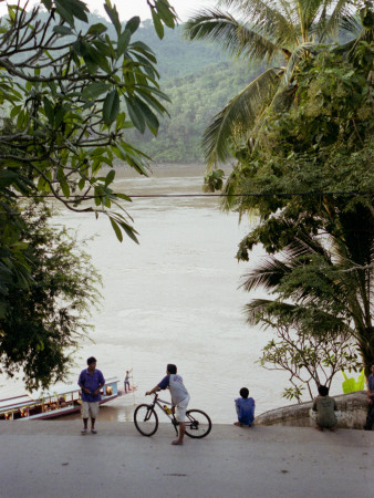 Boys At Sunset On The River, Laos by Eloise Patrick Pricing Limited Edition Print image