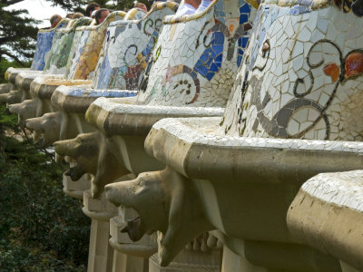 Colorful Tiles And Animal Heads At The Parc Guell, Designed By Gaudi by Stephen Sharnoff Pricing Limited Edition Print image