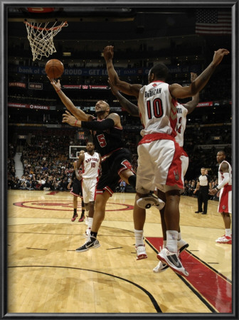 Chicago Bulls V Toronto Raptors: Carlos Boozer, Ed Davis And Demar Derozan by Ron Turenne Pricing Limited Edition Print image