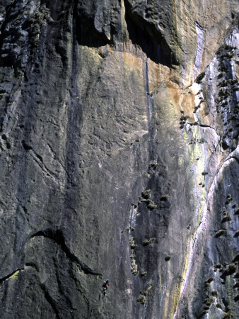Climber Perched On Large Rock Wall, Madagascar by Michael Brown Pricing Limited Edition Print image