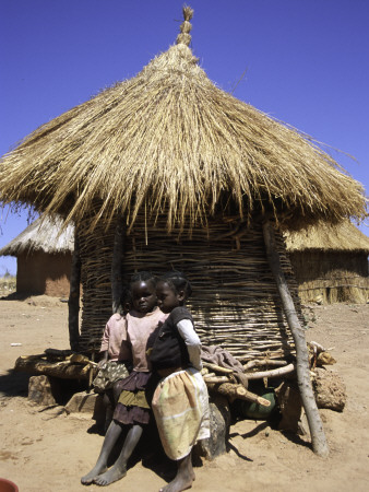 Children By Straw Huts, South Africa by Ryan Ross Pricing Limited Edition Print image