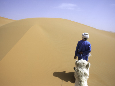 Riding A Camel, Morocco by Michael Brown Pricing Limited Edition Print image