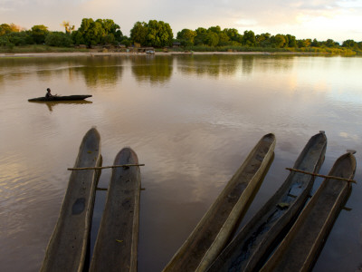 Traditional Piroque Boats In Manambolo River, Tsingys De Bemaraha National Park, East Madagascar by Inaki Relanzon Pricing Limited Edition Print image