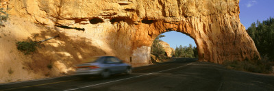 Car Moving Through The Tunnel, Arches National Park, Utah, Usa by Panoramic Images Pricing Limited Edition Print image