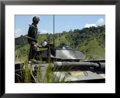The Philippine Marine Battalion Landing Team Fire The Weapons System Of A Light Armored Vehicle 300 by Stocktrek Images Pricing Limited Edition Print image