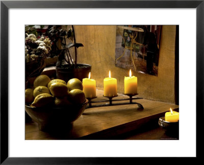 Still Life With Lighted Candles And Bowl Of Lemons In Coffee Shop, Tallinn, Estonia by Nancy & Steve Ross Pricing Limited Edition Print image