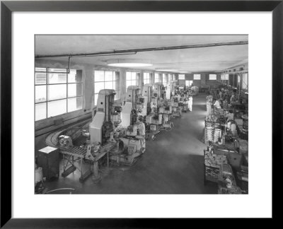 Assembly Line For The Production Of Pieces Of Motor-Bikes, At The Ducati Factory In Bologna by A. Villani Pricing Limited Edition Print image