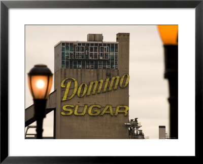 Exterior Of Domino Sugar Building, Brooklyn, With Street Lanterns In Foreground by Michelle Bennett Pricing Limited Edition Print image