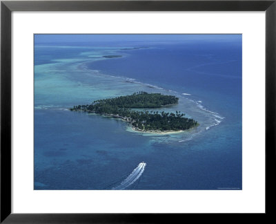 Aerial Of Boat Over Glover's Reef And Islands, Belize by Kenneth Garrett Pricing Limited Edition Print image