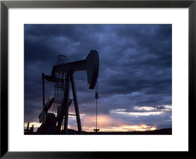 Oil Rig Silhouetted At Sunset, Adobe Town, Wyoming by Joel Sartore Pricing Limited Edition Print image