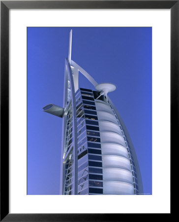 Arabian Tower, Dubai, United Arab Emirates by Walter Bibikow Pricing Limited Edition Print image