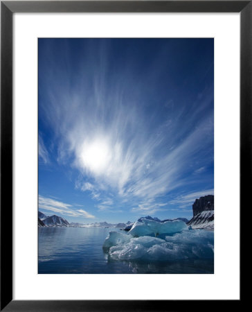 Blue Ice Under A Blue Sky With Streaky Clouds, Hornsund, Spitsbergen Island, Svalbard, Norway by Ralph Lee Hopkins Pricing Limited Edition Print image