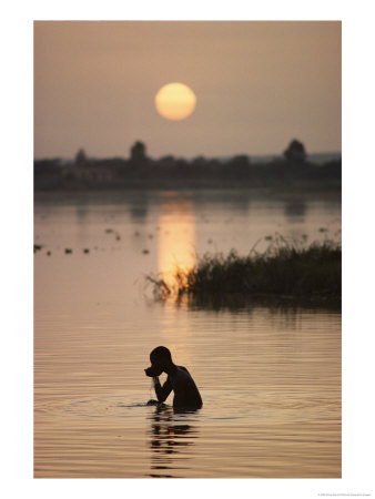 Person Bathing In The Niger River by Steve Raymer Pricing Limited Edition Print image