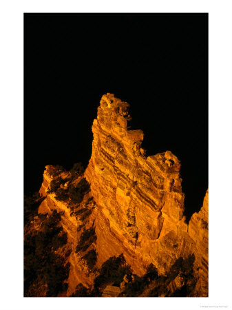 A Wall Of Rock In The Late Afternoon Sunlight In The Grand Canyon National Park by Mark Newman Pricing Limited Edition Print image